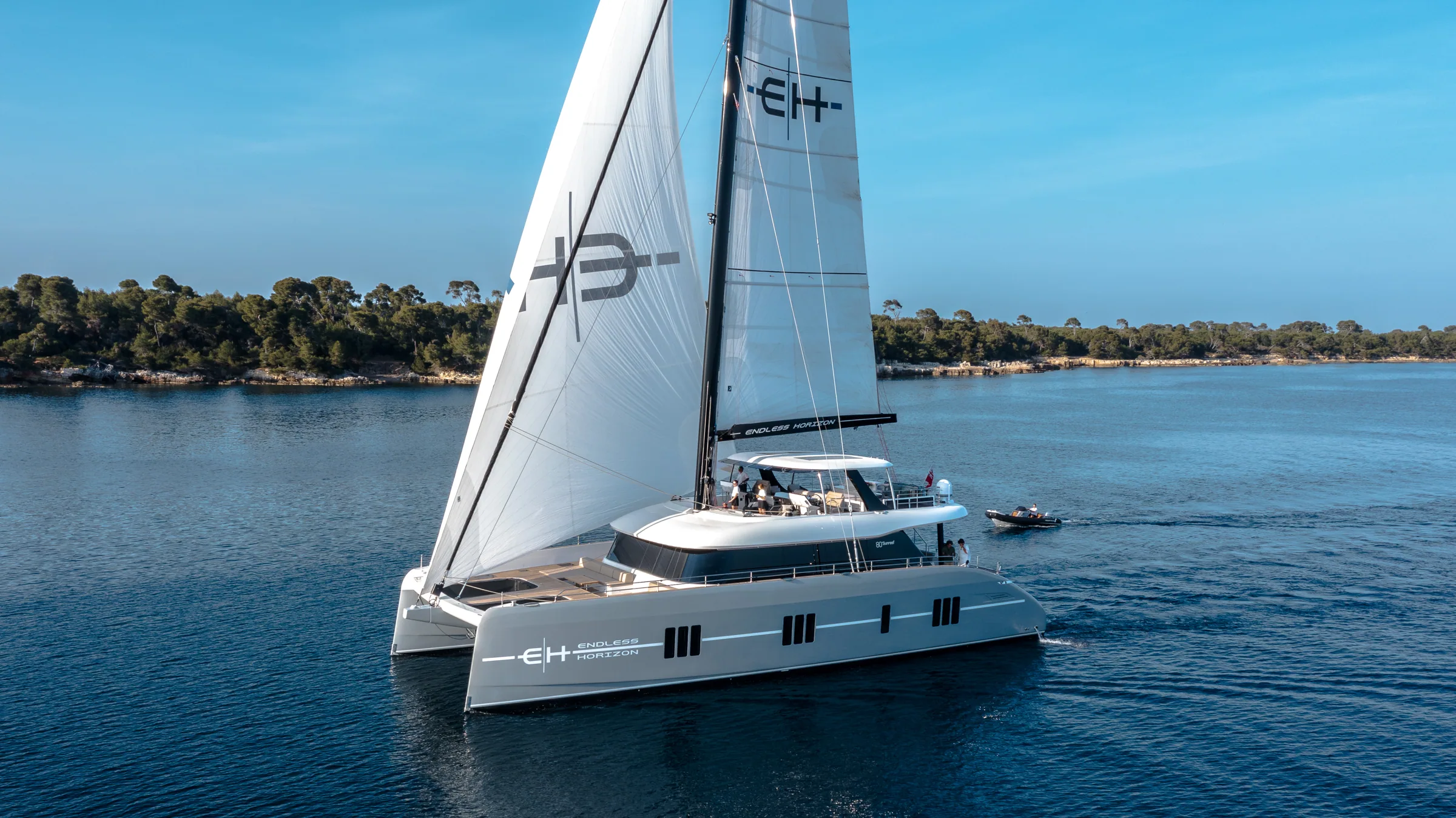 Endless Horizon II at anchor in a Caribbean bay at golden hour